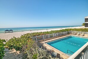 A heated pool - Seaside Beach House 101 · Dolphins from Balcony · Gulf Pool (Holmes Beach)
