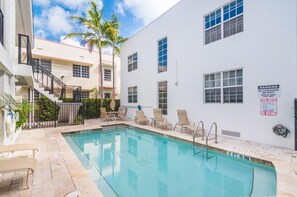 Outdoor pool, a heated pool - Modern SoBe Gem! Balcony, Pool, Walk to Beach, BBQ, Fast Wi-Fi, Near Hotspots (Miami Beach)