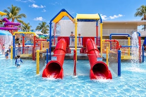 A water park with multiple slides and play structures. - South of Fifth 1BR Condo - Heated Pool, Balcony & Walk to Beach (Miami Beach)