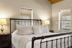 Bedroom one at the Ranch House has a king size bed - 10 Bedroom Hill Country Retreat with Pickleball, Tennis and Pool- Stonehaven Ran (San Marcos)
