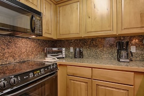 Microwave, stovetop, dishwasher, coffee/tea maker