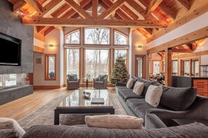 Télévision, cheminée, table de tennis de table, chaßne hi-fi