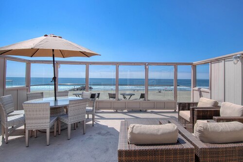 Spectacular oceanfront upper unit with amazing views from awesome roof top deck!