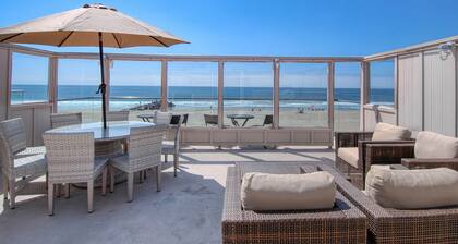 Spectacular oceanfront upper unit with amazing views from awesome roof top deck!
