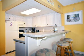 Fridge, microwave, oven, stovetop - Spacious, comfy 2 bedroom condo with free WiFi and a wide balcony located midtown on the ocean block just a short walk to the beach! (Ocean City)