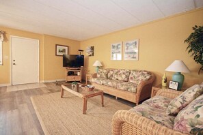 Living area - Spacious, comfy 2 bedroom condo with free WiFi and a wide balcony located midtown on the ocean block just a short walk to the beach! (Ocean City)