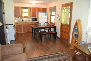 Living area - Family resort cottage 3 on Big Glen Lake, Rent 1 or 5, dock, kayaks, rowboat (Maple City)