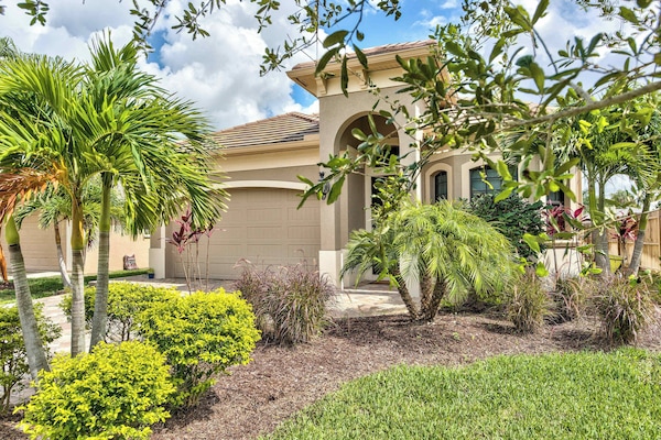 Exterior of Home, Lush lawn and tropical landscaping