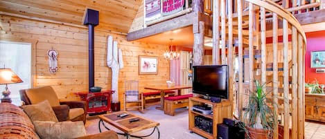 Een smart-tv, een open haard en een dvd-speler