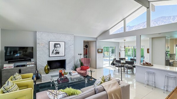 Smart TV, fireplace, books