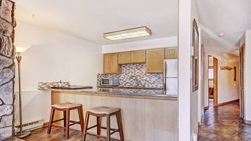 Microwave, stovetop, dishwasher, coffee/tea maker