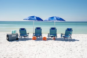 On the beach, sun-loungers, beach towels