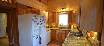 Cozy waterfront sunset cottage on Lake Leelanau. Air, Near Leland.