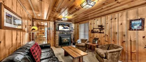 Televisio, takka, DVD-soitin, stereot