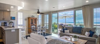 Lovely lower unit with spectacular oversized patio right on the sand!