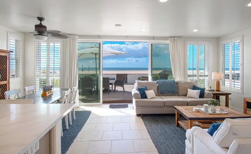 Lovely lower unit with spectacular oversized patio right on the sand!