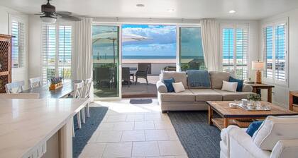 Lovely lower unit with spectacular oversized patio right on the sand!