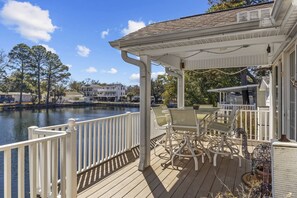 Outdoor dining - Ocean Lakes Lakefront Palace - Private Hot Tub & Golf Cart Included! (Myrtle Beach)