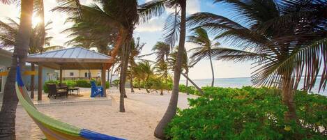On the beach, sun-loungers, beach towels