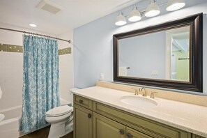 Combined shower/tub, hair dryer, towels, soap
