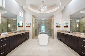 Bathtub, jetted tub, hair dryer, towels