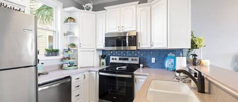 Fridge, microwave, dishwasher, coffee/tea maker