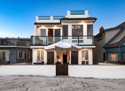 Beautiful, one-of-a-kind upper unit with incredible roof-top deck with hot tub