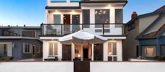 Beautiful, one-of-a-kind upper unit with incredible roof-top deck with hot tub