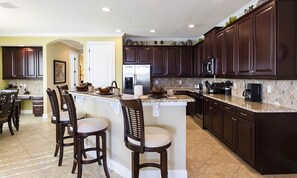 Fridge, microwave, oven, stovetop - Sleek Home with Stunning Game Room at Reunion (Kissimmee)