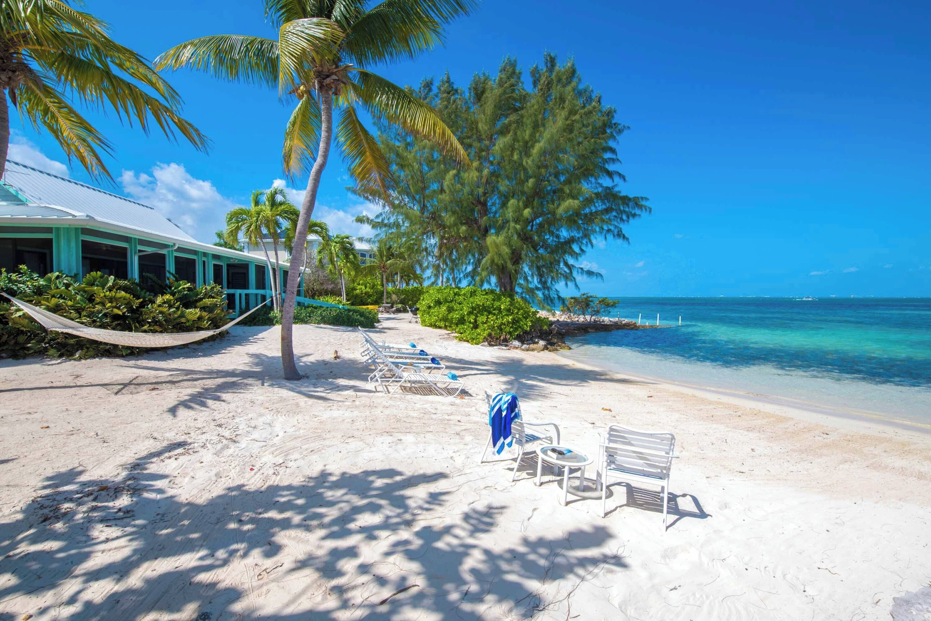 On the beach, sun-loungers, beach towels