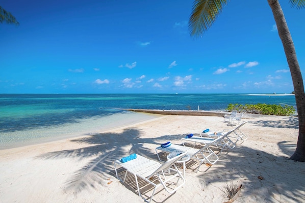 On the beach, sun-loungers, beach towels