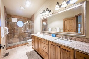 Bathtub, hair dryer, towels, soap