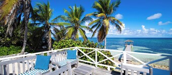 Castaway Cove: Beach House w/Backyard Snorkeling, Dock, + Modern Interiors