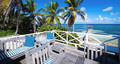 Castaway Cove: Beach House w/Backyard Snorkeling, Dock, + Modern Interiors
