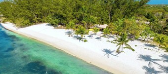 Sea Beauty: Cottage confortable de style caïman avec 300 pieds de plage privée