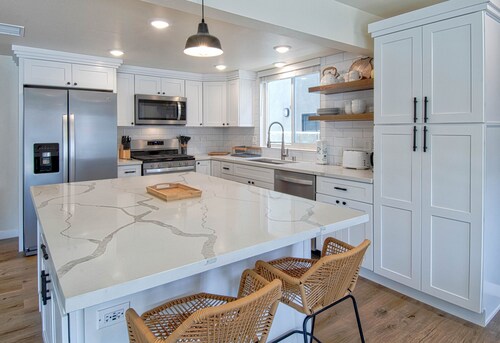 Spectacular ocean views await you from the large patio at this newly remodeled lower unit!