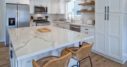 Spectacular ocean views await you from the large patio at this newly remodeled lower unit!