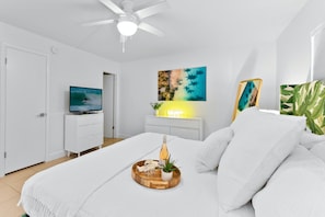 Master bedroom features a king bed - Beachfront Penthouse w/ Ocean Views & Pool – Walk to Pier☀️ (Cocoa Beach)
