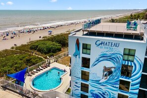A heated pool - Beachfront Penthouse w/ Ocean Views & Pool – Walk to Pier☀️ (Cocoa Beach)