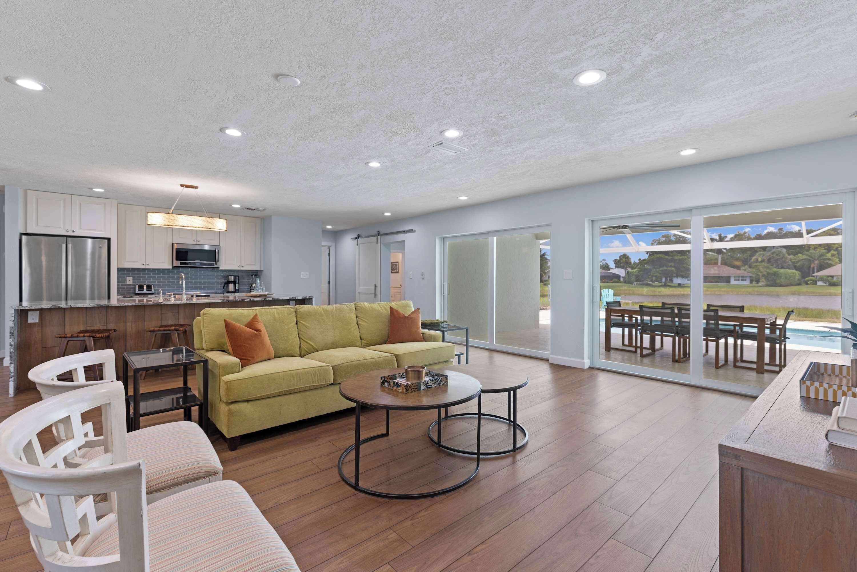 Beautiful Living Room with TV and Entrance to Lanai