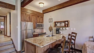 Microwave, stovetop, dishwasher, coffee/tea maker