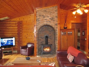 TV, fireplace, DVD player, video library - Lake Superior Beachfront Cabin Private Sandy Beach & Grand Island Views (Munising)
