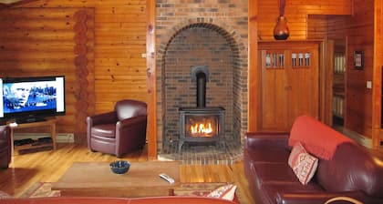 A Grand Island View on a Big Sandy Beach, Fireplace, Screened porch!