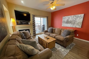 Enjoy the comfortable living area and TV! - Spacious w/ 2enSuites, Steps2Bus, Garage, & Games! (Steamboat Springs)