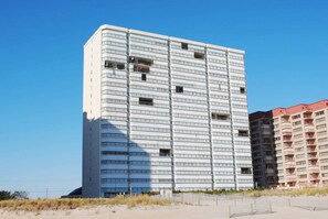 Exterior - Stylish, spacious 2 bedroom oceanfront condo with owner provided WiFi, 3 flat screen televisions (all with HBO and Disney channels and blue ray players) , floral decor, and a deluxe balcony with a spectacular ocean view located uptown just steps to (Ocean City)