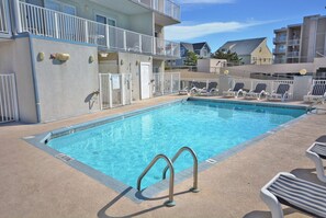 Pool - Bright, cozy luxury 3 bedroom ocean block condo with WiFi and an outdoor pool located near downtown and less than a block from the beach! Linens included and beds maid, hotel service in the condo. (Ocean City)