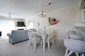 Dining - Bright, cozy luxury 3 bedroom ocean block condo with WiFi and an outdoor pool located near downtown and less than a block from the beach! Linens included and beds maid, hotel service in the condo. (Ocean City)