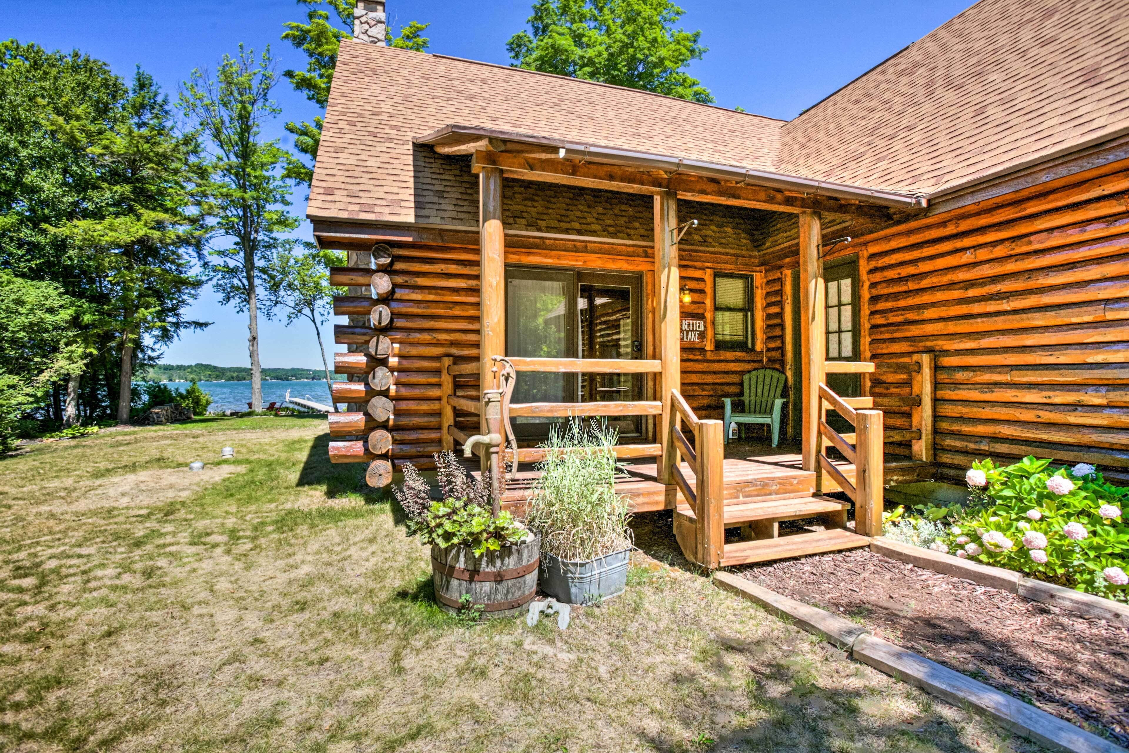 Waterfront Lake Leelanau Log Cabin w/ Private Dock