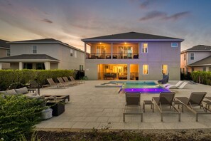 A heated pool, pool loungers