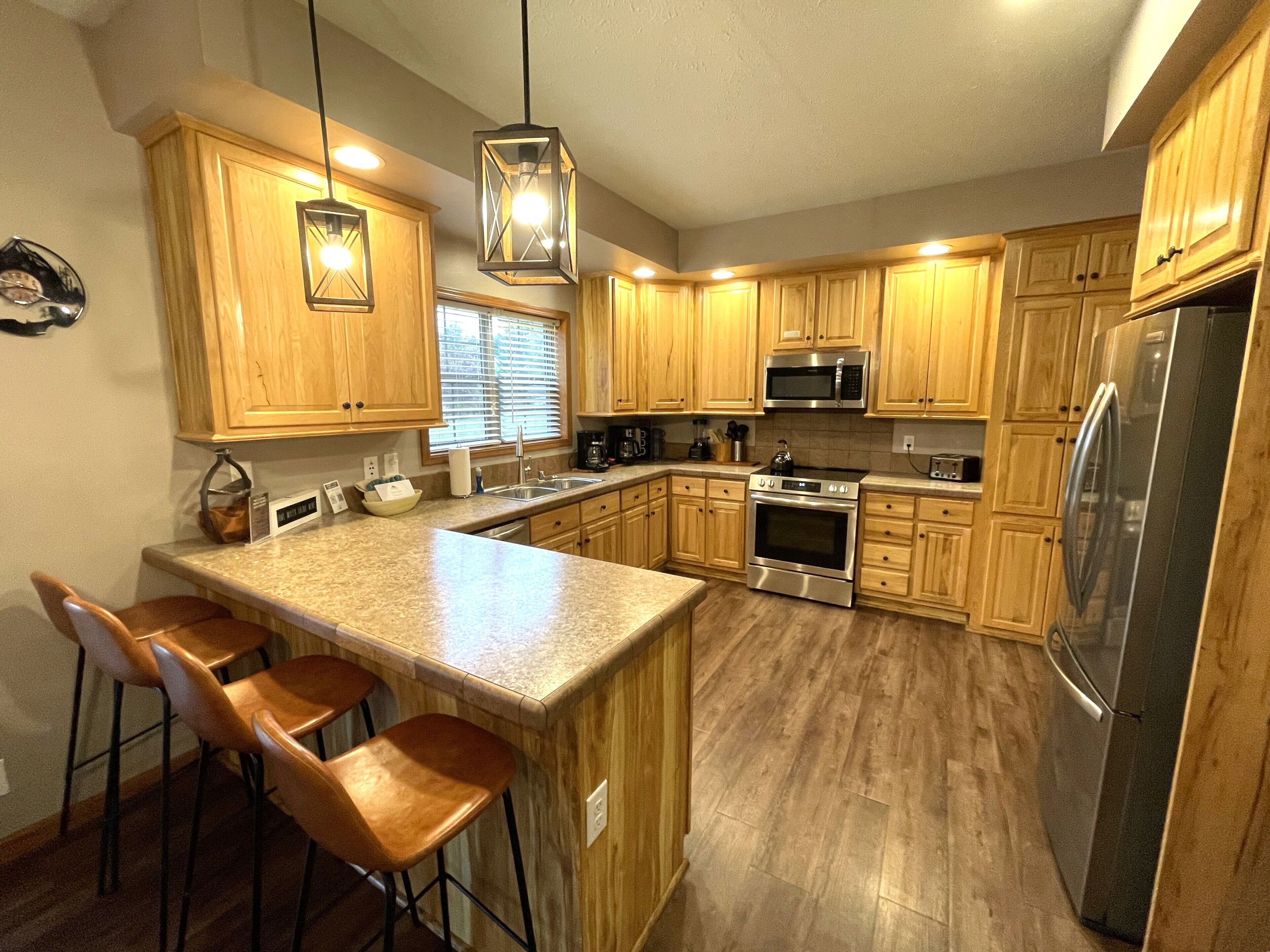 Refrigerador, microondas, horno y parrilla de estufa 